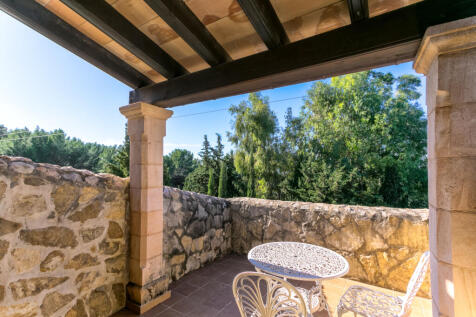 Sunny balcony with seating corner