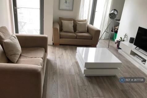 Sitting Room With French Doors And  Balcony