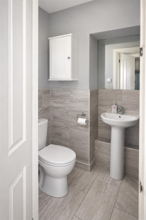 Modern Grey-Tiled Cloakroom.png