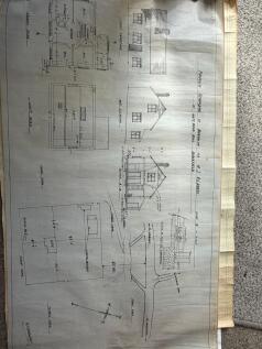 The original plans showing additional outbuildings no longer there