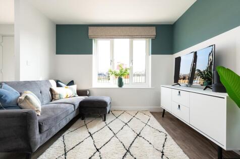 The lounge is a versatile space that leads through to the kitchen/dining area