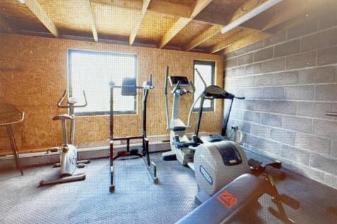 Office_ gym space above garage.jpg