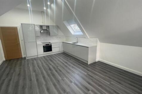 Bright, modern open-plan kitchen in a refurbish...