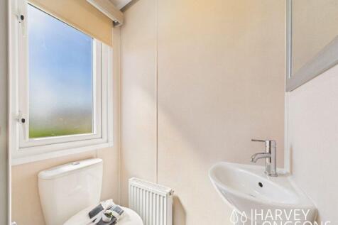 Regal Charmouth en-suite WC with toilet and hand b