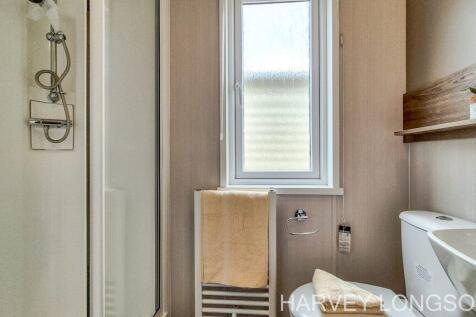 Modern bathroom and shower facilities inside the S