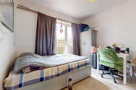 Bright, neatly presented bedroom with a double ...