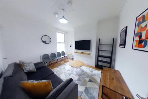 A spacious and inviting large modern living roo...