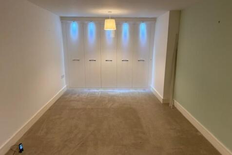Bed to wardrobes.jpg