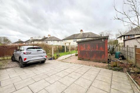 Driveway &amp; Garage to the Rear
