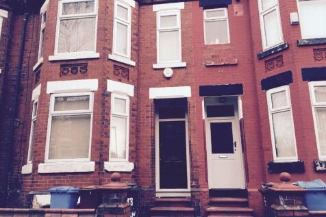 Charming red brick terraced house with bay wind...