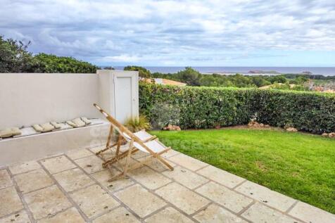 Apartment with sea views and private garden in Coves Noves