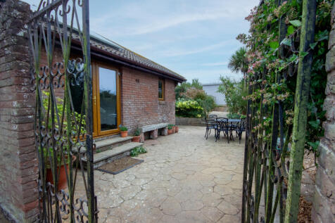 Rustic Patio with Ornate Gates copy 2