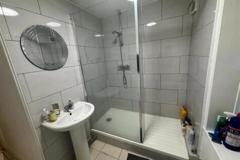 A clean and well-maintained bathroom featuring ...