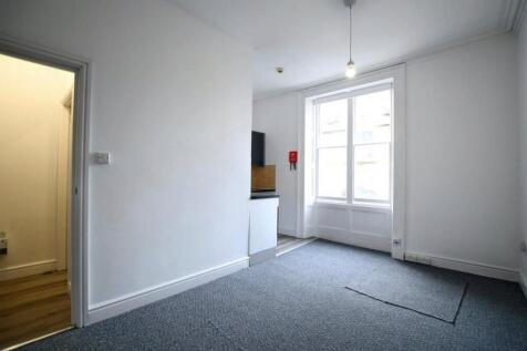Bright and airy room with large window...