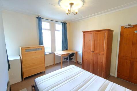 Bright furnished double bedroom with a large wi...
