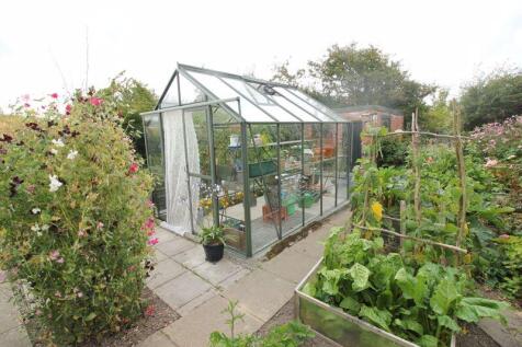 greenhouse and veg garden