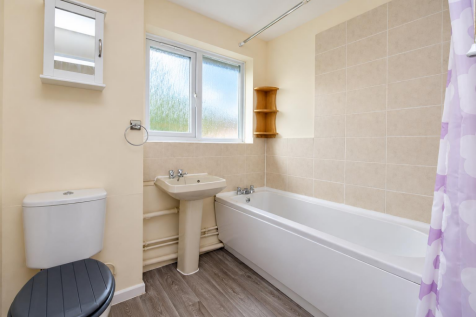 Bright Neutral Bathroom Interior.png