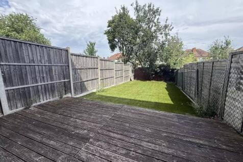 Spacious private garden with wooden decking...