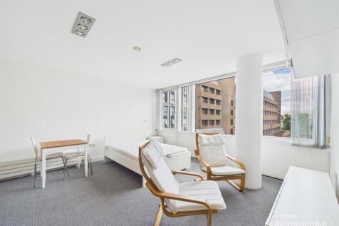 A609, One Park West - living area and bed 2.jpg