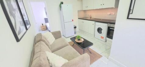 Bright open-plan lounge and modern kitchen...