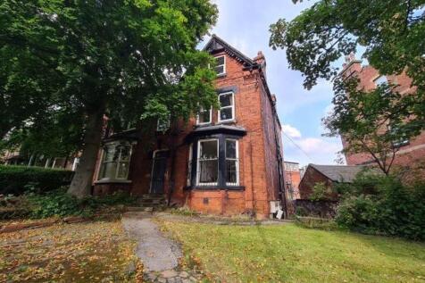 Charming red-brick semi-detached house surround...