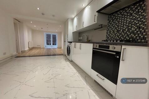 Open Plan Sitting Room And Kitchen