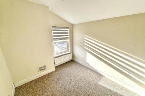 Bright bedroom filled with natural sunlight...