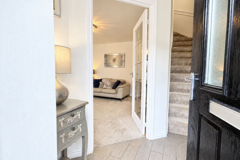 Welcoming Modern Entryway and Living Room.png