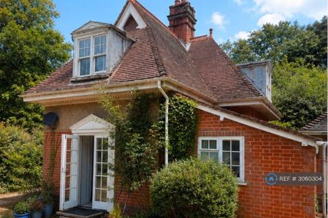 Side Aspect With French Doors To Garden