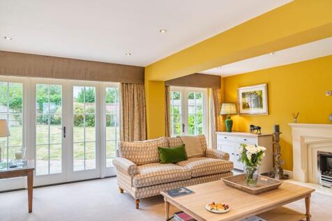 Patio doors on both sides of the Living room