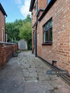 Garden Surrounds The House, Patio Sitting Area