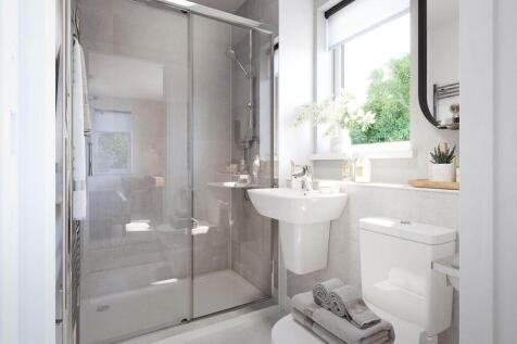 Bedroom 1 also hosts a private en suite shower room