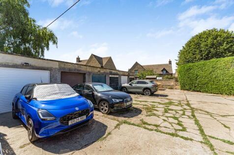 Garage plus space in front