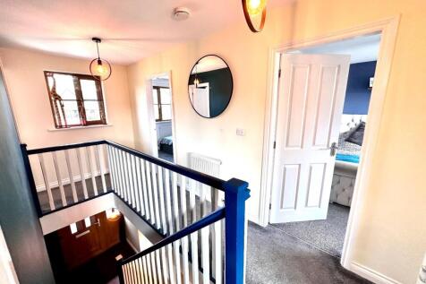 TO THE FIRST FLOOR LANDING