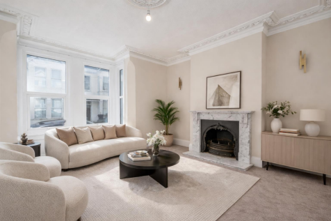 Modern living room with sleek elegance.png