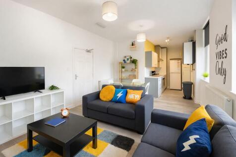 Bright open-plan living area with vibrant decor...