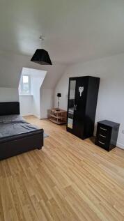 Bright and airy bedroom with ample floor space...