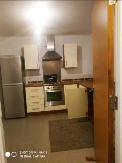 Modern kitchen with integrated appliances...