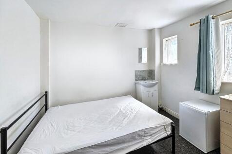 Bright double bedroom with private vanity sink...