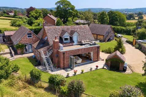 Aerial View of a Charming Countryside Home.jpg