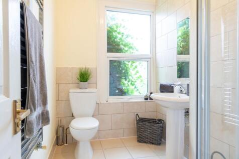 Bright, well-presented bathroom with a modern w...