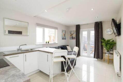 Bright, modern open-plan living and dining area...