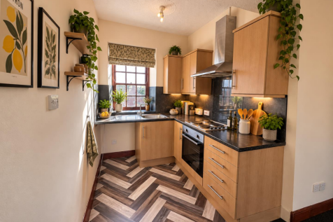 Scandi-Cozy Galley Kitchen with Greenery.png