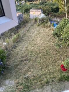 Spacious long garden area with outdoor potentia...