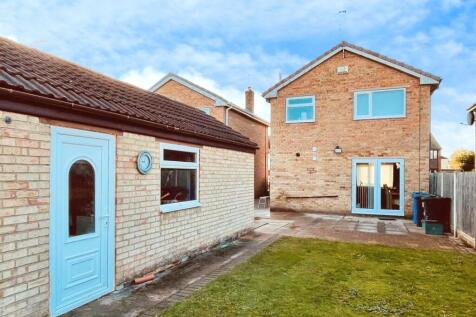 Rear Of Home