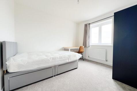 Bright double bedroom with modern study area...