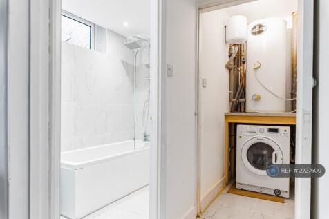 Utility Closet And Washer Dryer