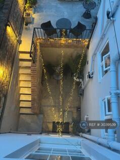 Evening Courtyard With Feature Lighting