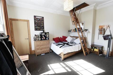 Bright spacious bedroom with unique loft access...