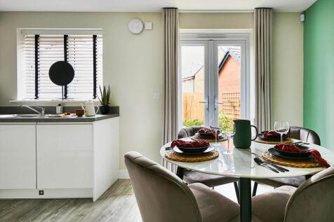 Double doors to the garden make al fresco dining easy